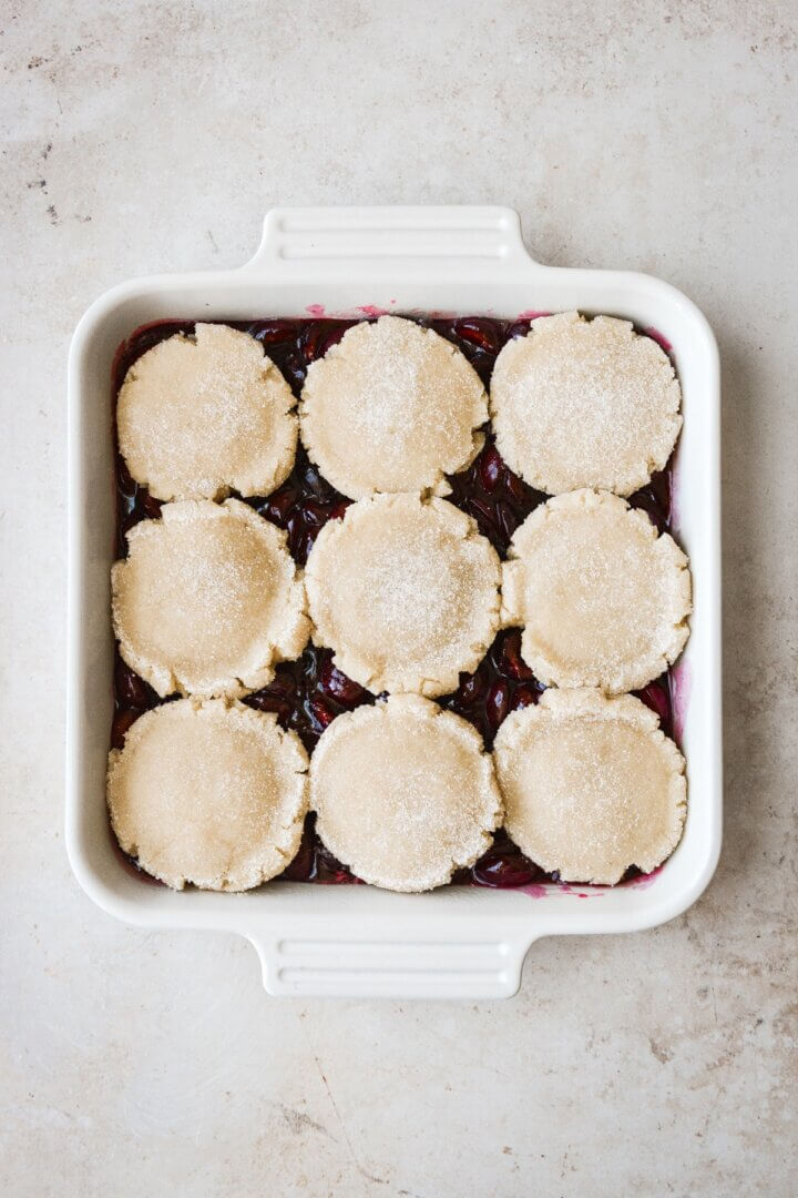 Cherry filling topped with unbaked sugar cookies.