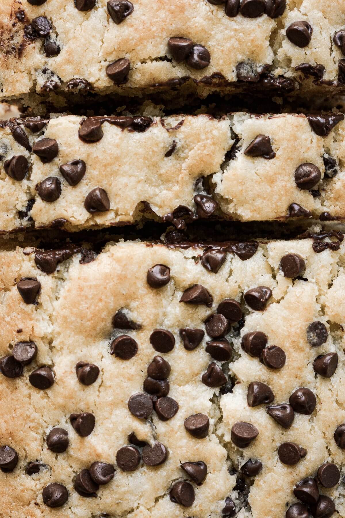 Chocolate chip loaf cake cut into slices.
