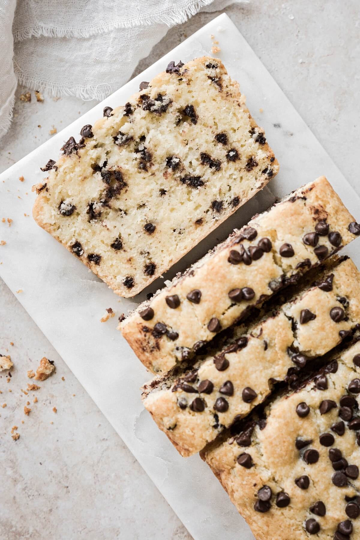 Slices of chocolate chip sour cream loaf cake.