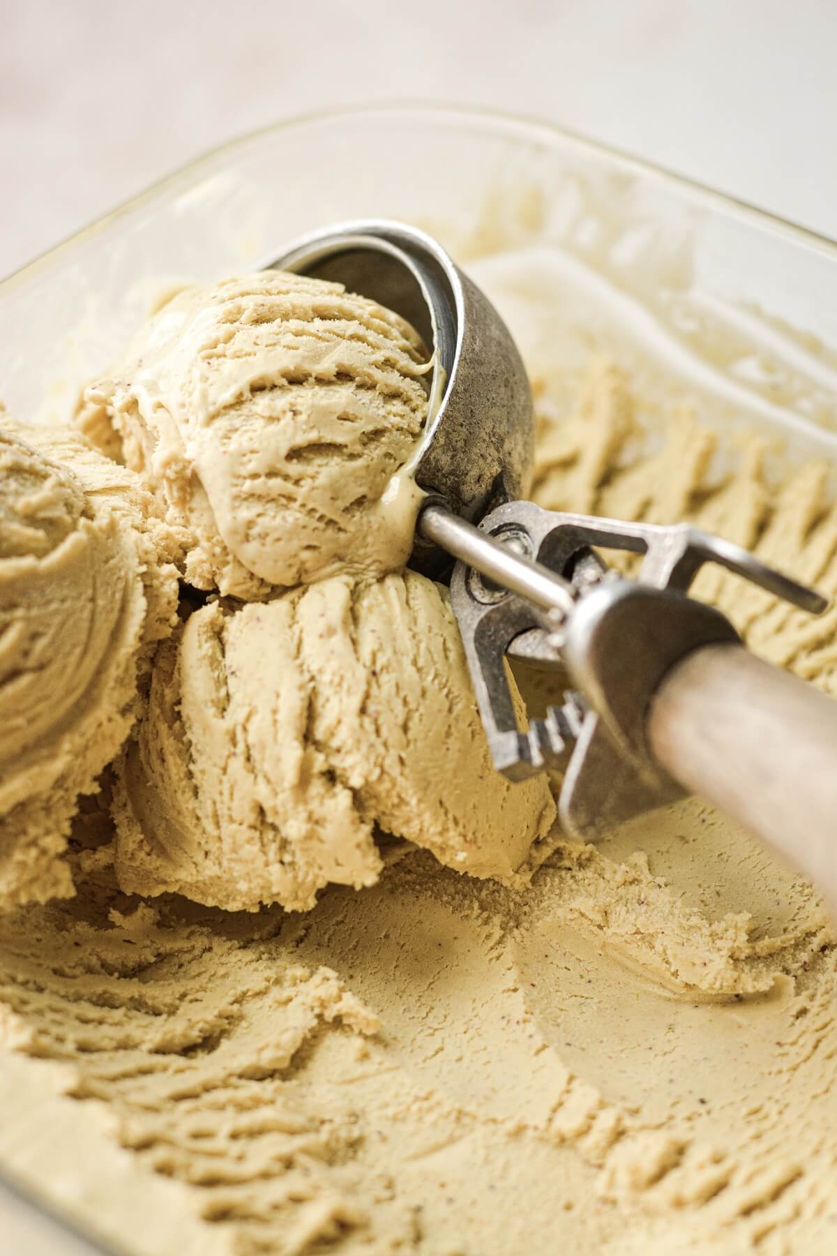 Scoops of no churn pistachio ice cream.