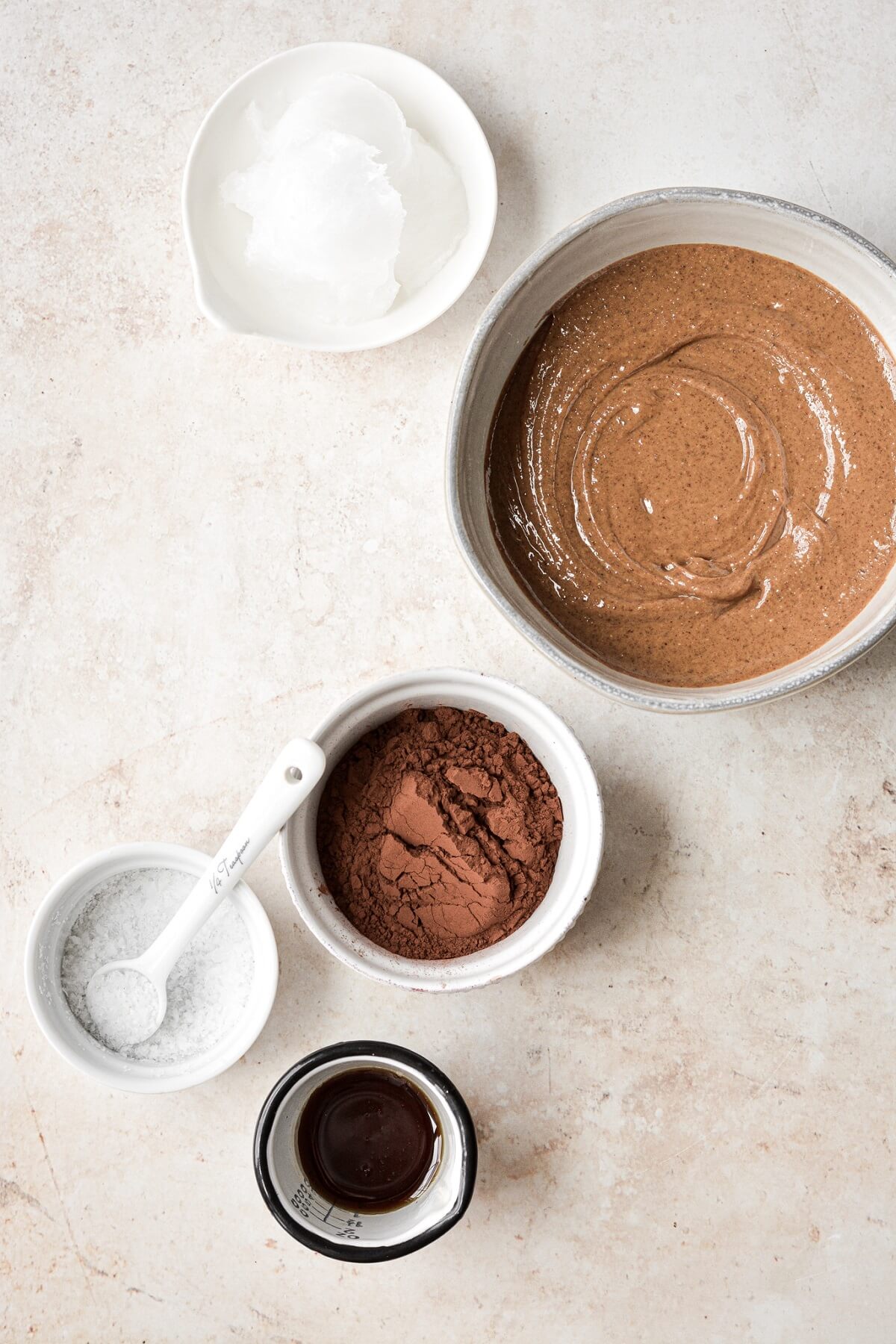 Ingredients for making frozen chocolate almond butter bites.