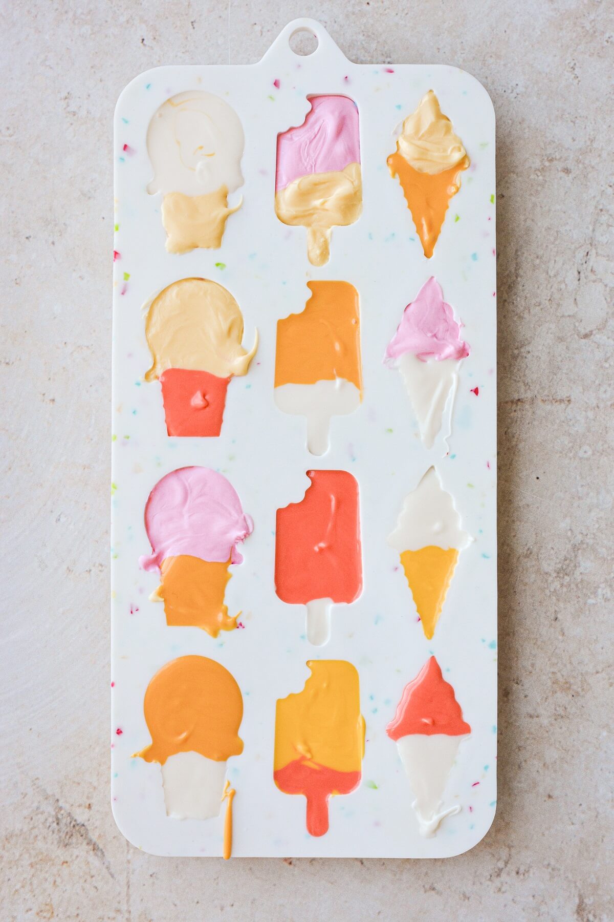 Candy melt ice cream cones in a silicone mold.