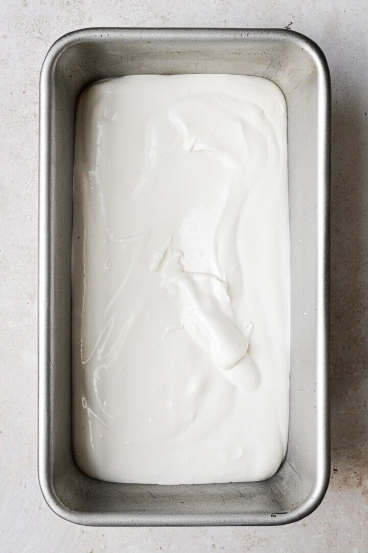 Step 3 for making no churn peanut butter vanilla fudge ripple ice cream.
