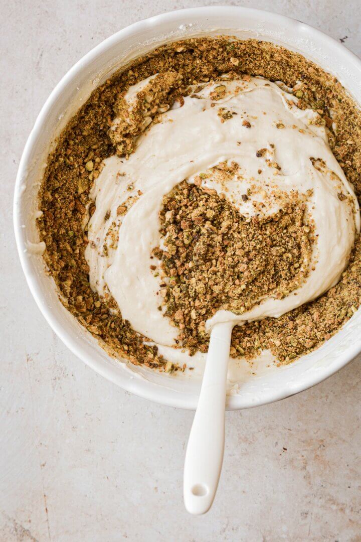 Step 9 for making pistachio coconut cake.