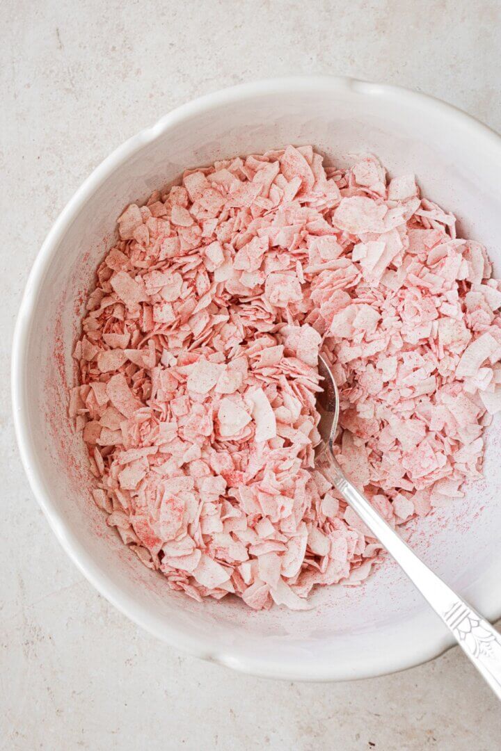 Bowl of pink strawberry coconut.