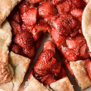 Strawberry galette with one slice cut.