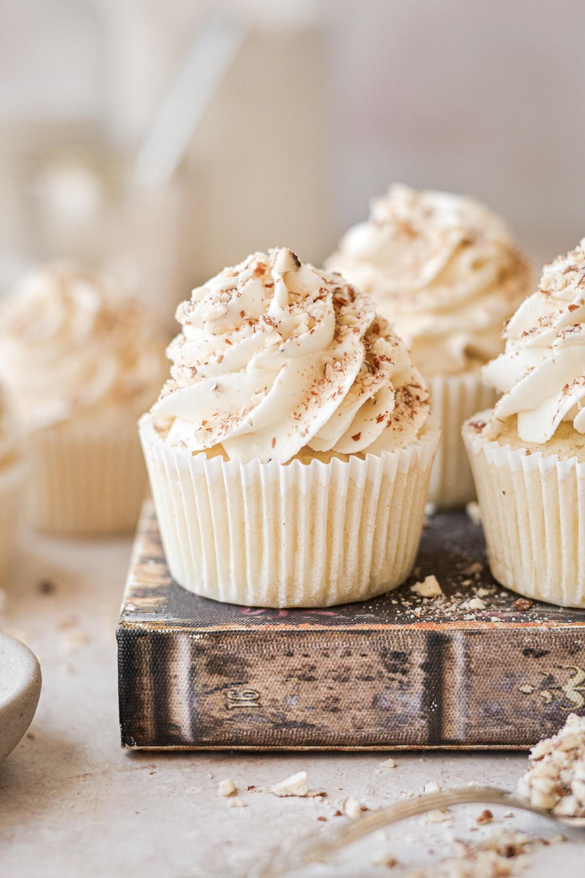 Almond cupcakes sprinkled with chopped almonds.
