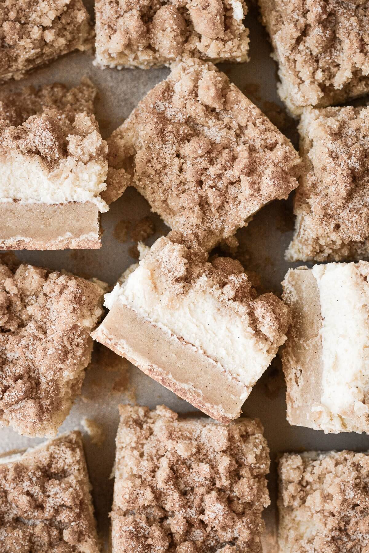 Squares of snickerdoodle cheesecake.