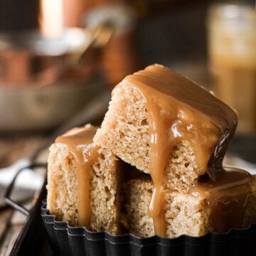 Squares of brown butter cake drizzled with toffee sauce.