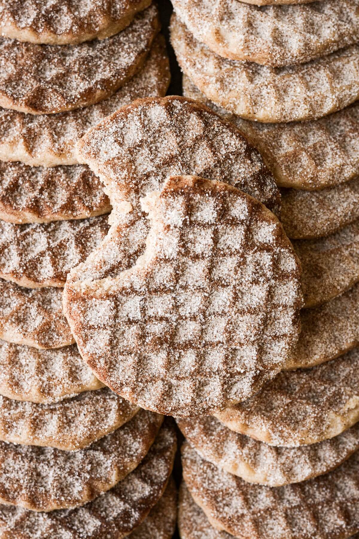 Snickerdoodle shortbread cookies sprinkled with cinnamon sugar.