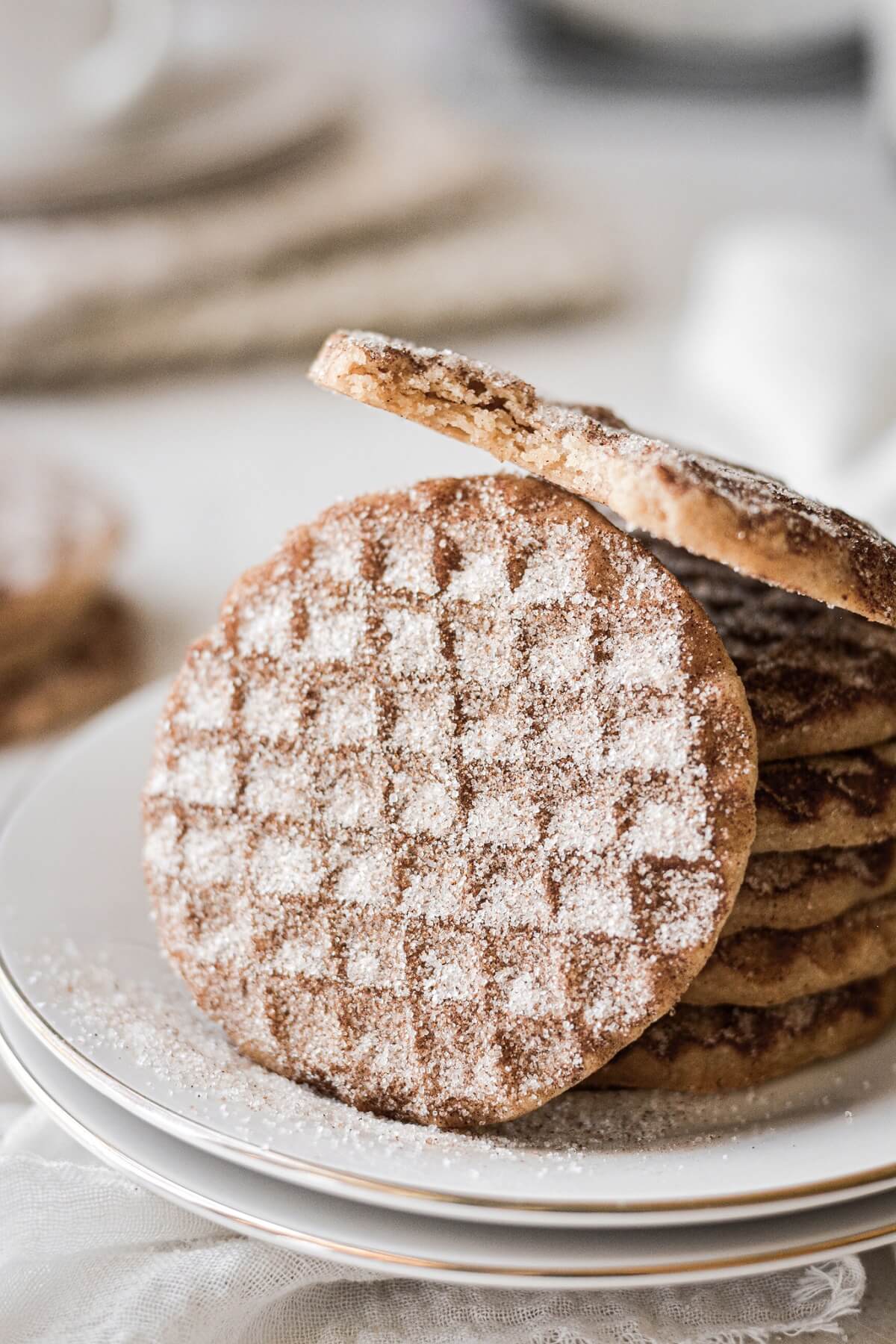 Snickerdoodle shortbread cookies with cinnamon sugar on a plate.