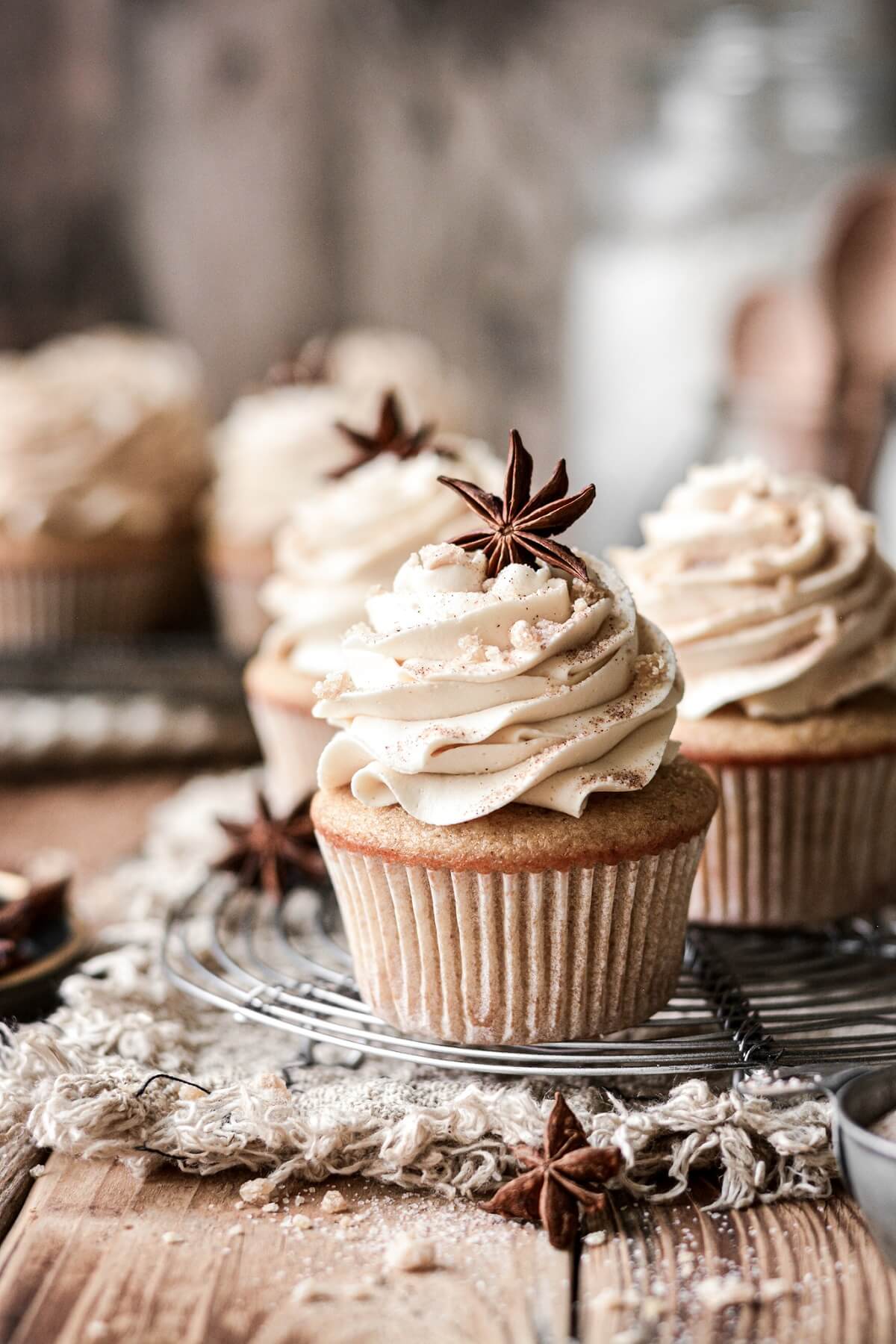 Brown sugar spice cupcakes topped with star anise.