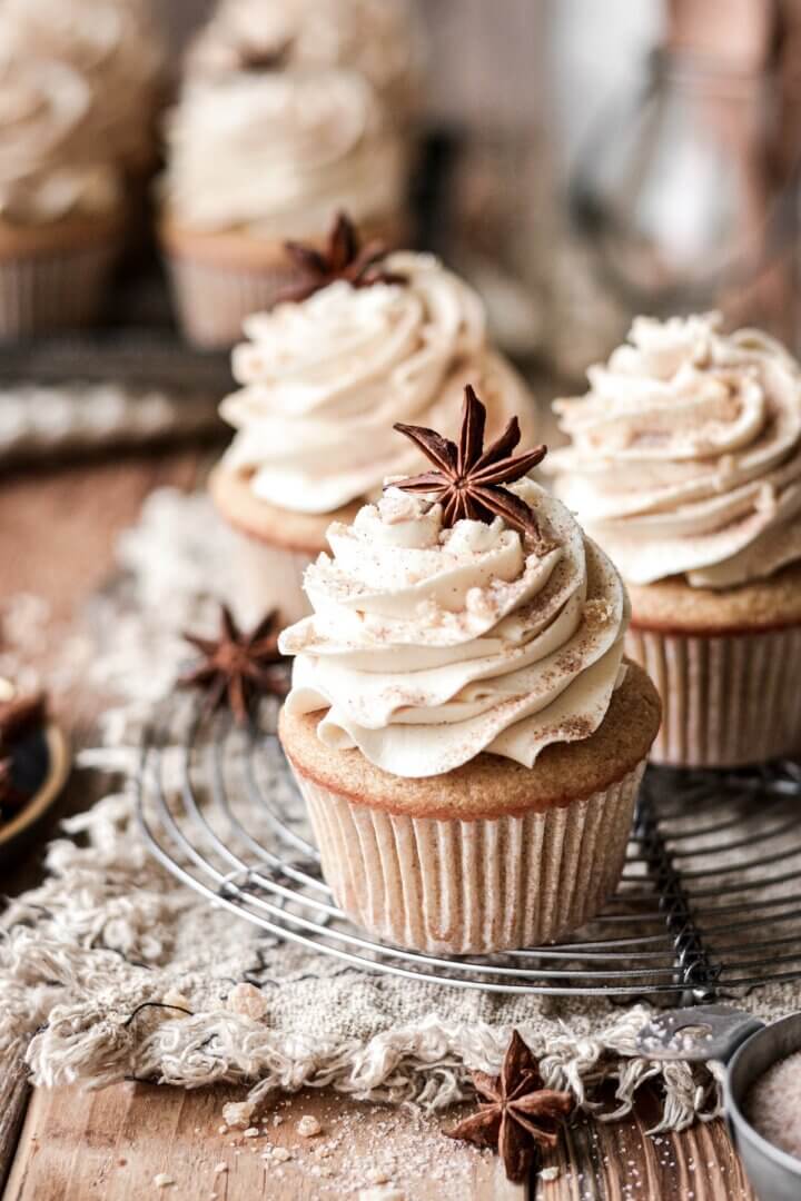 Star anise and crystallized ginger on spice cupcakes.