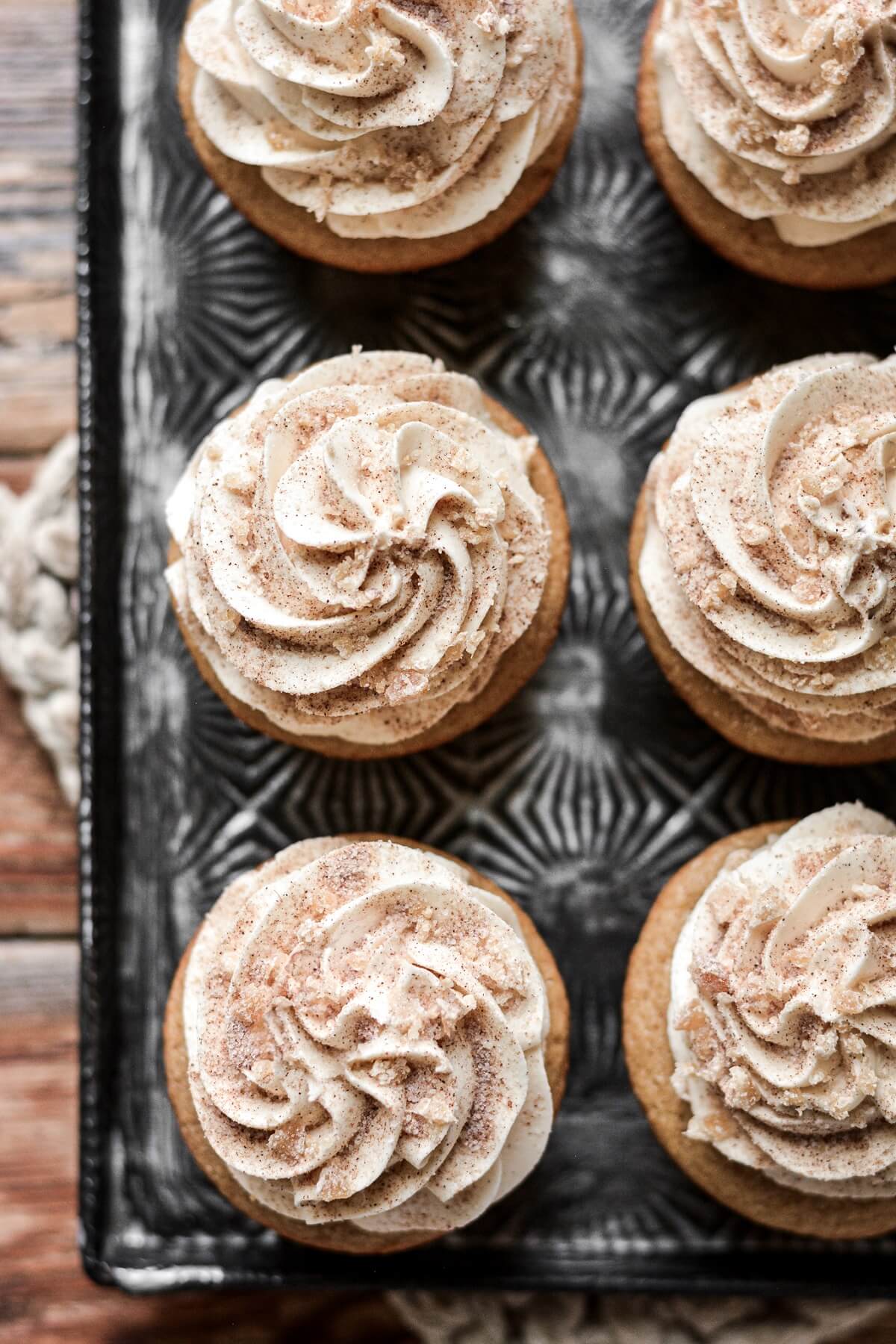 Frosting swirls on top of cupcakes.