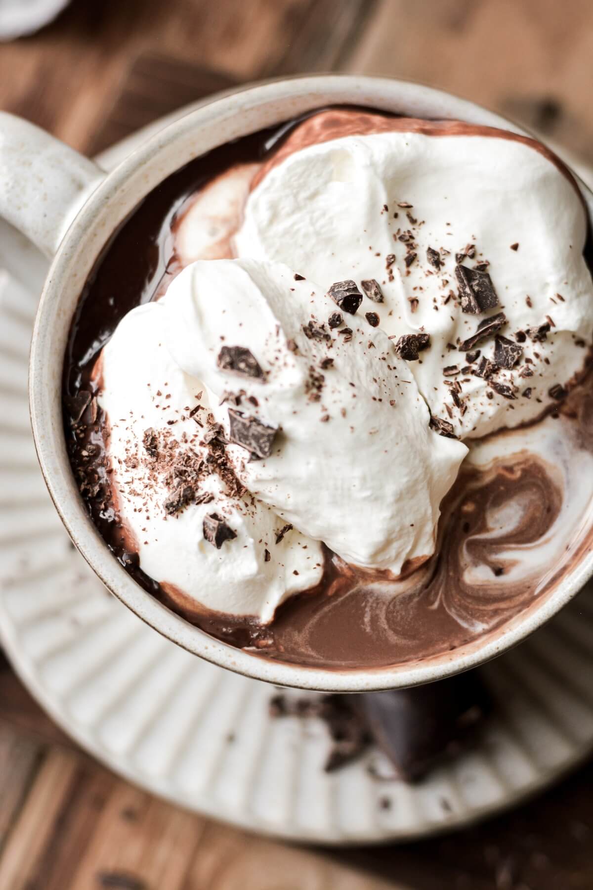 Chocolate shavings and whipped cream on European hot chocolate.