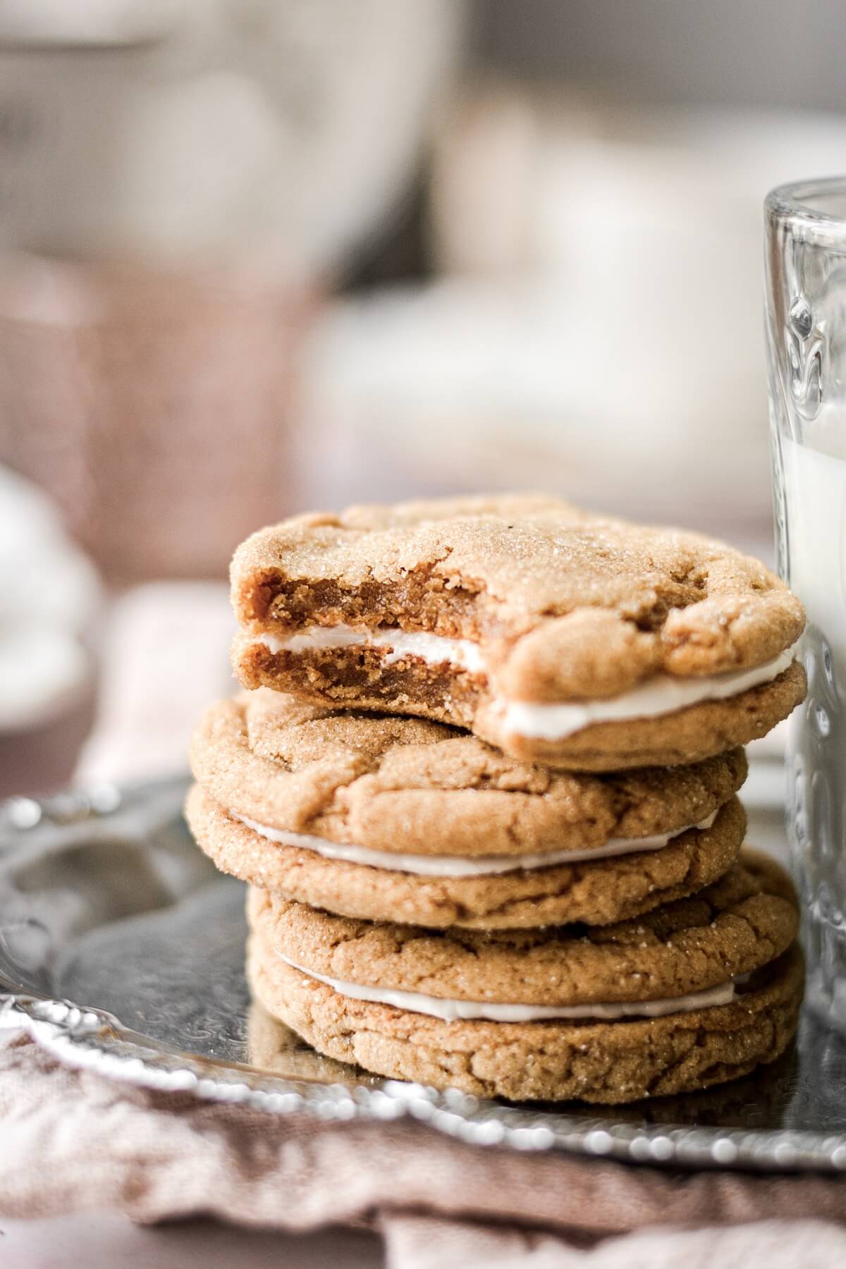 Ginger molasses cookie sandwiches with lemon icing.