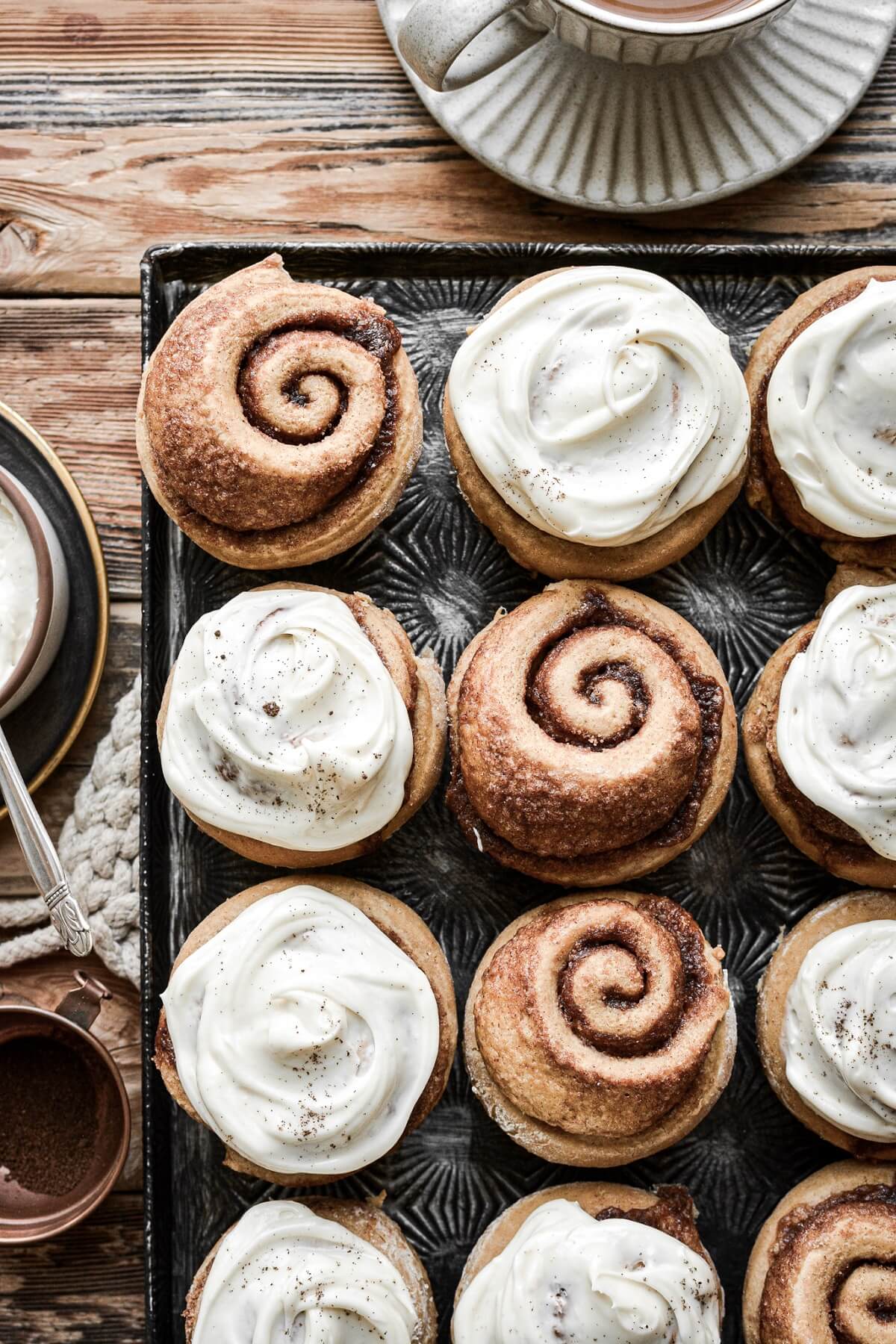 Gingerbread cinnamon rolls with cream cheese frosting.