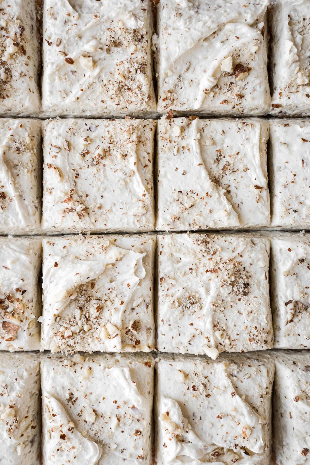 Squares of almond cake with almond buttercream.