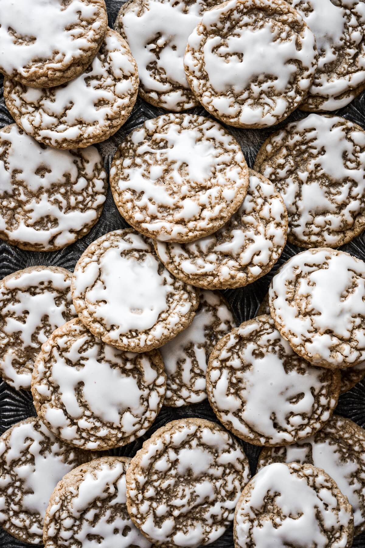 Vanilla glaze on iced oatmeal cookies.