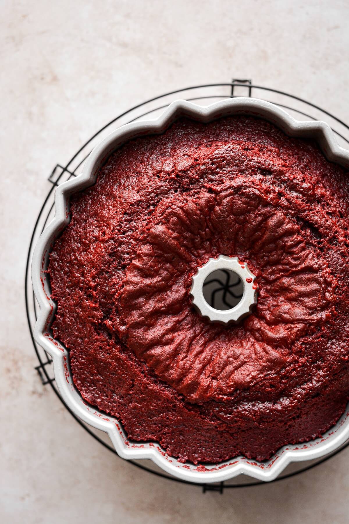 Step 6 for making red velvet bundt cake.
