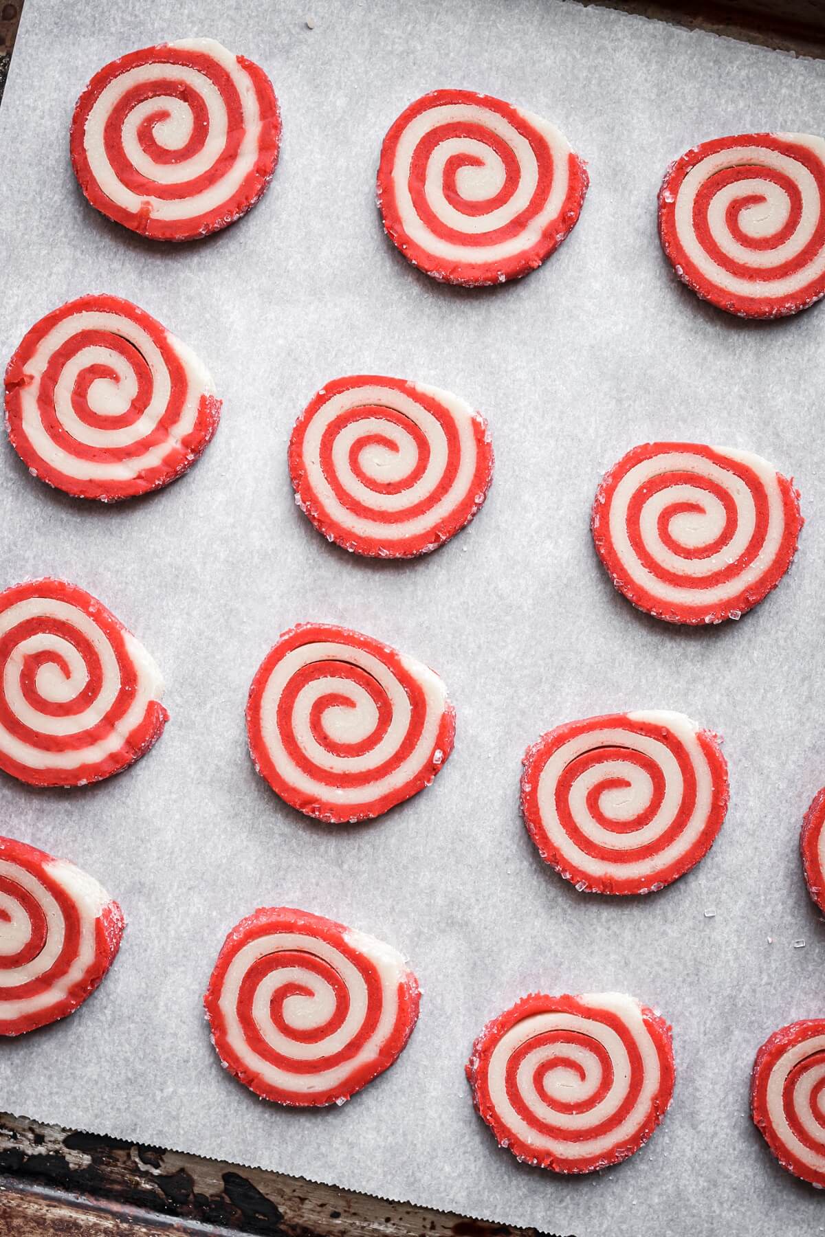 Step 6 for making red and white pinwheel cookies.