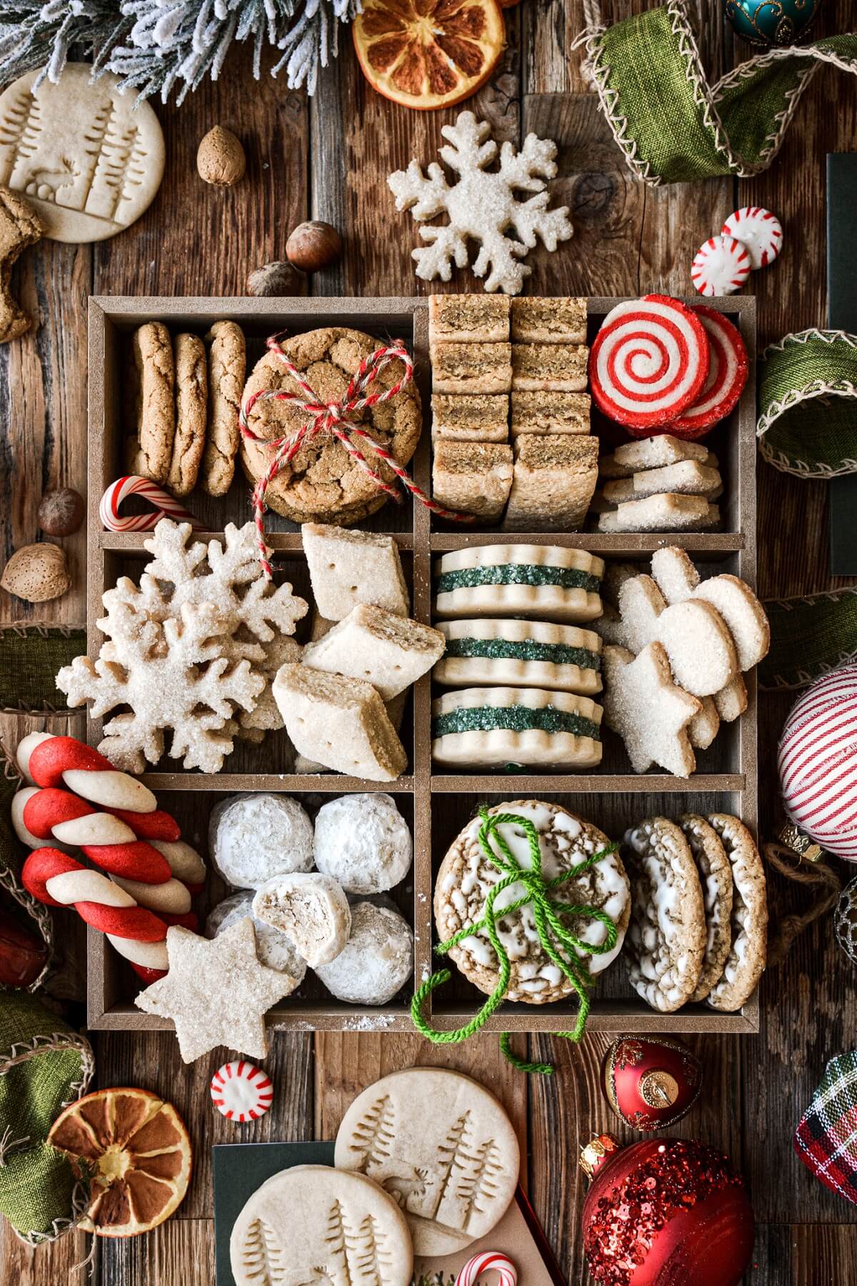 Old fashioned Christmas cookie box full of cookies.