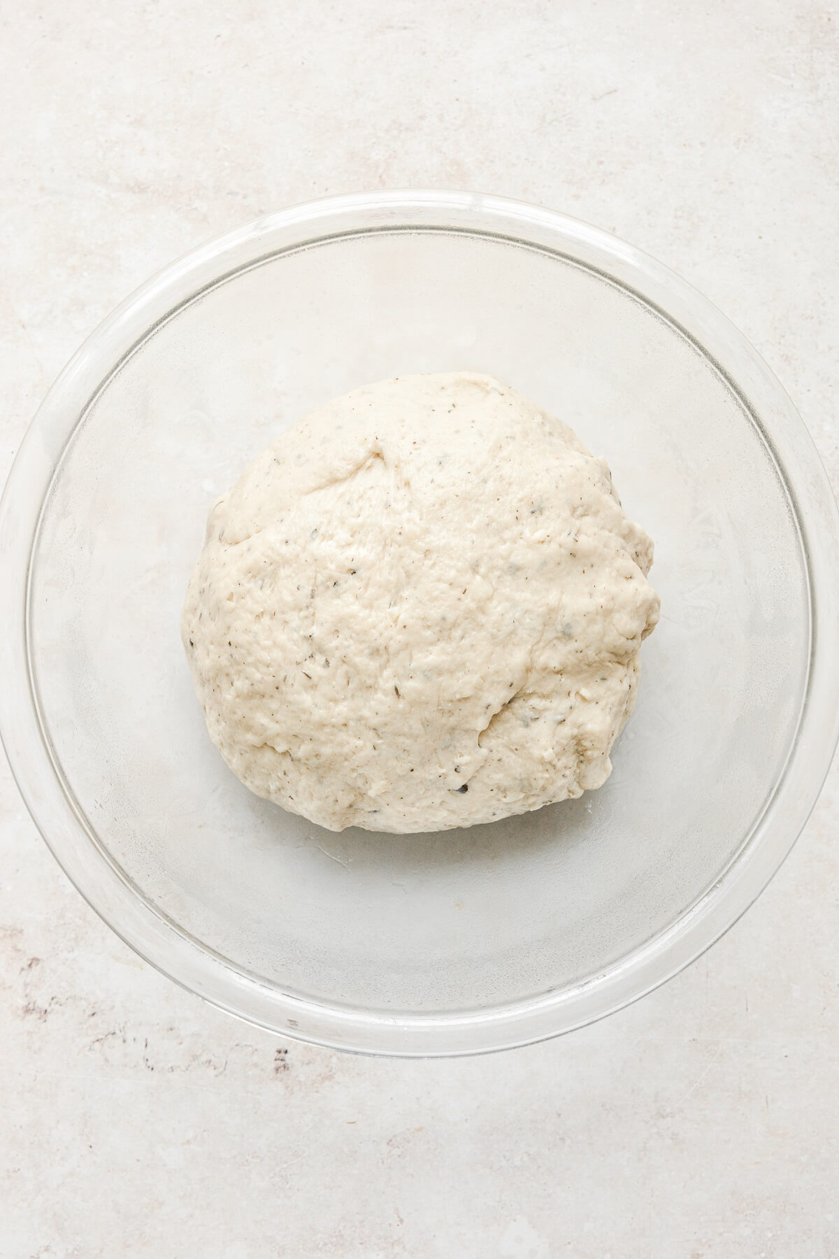 Step 6 for making cheesy garlic herb bread rolls.