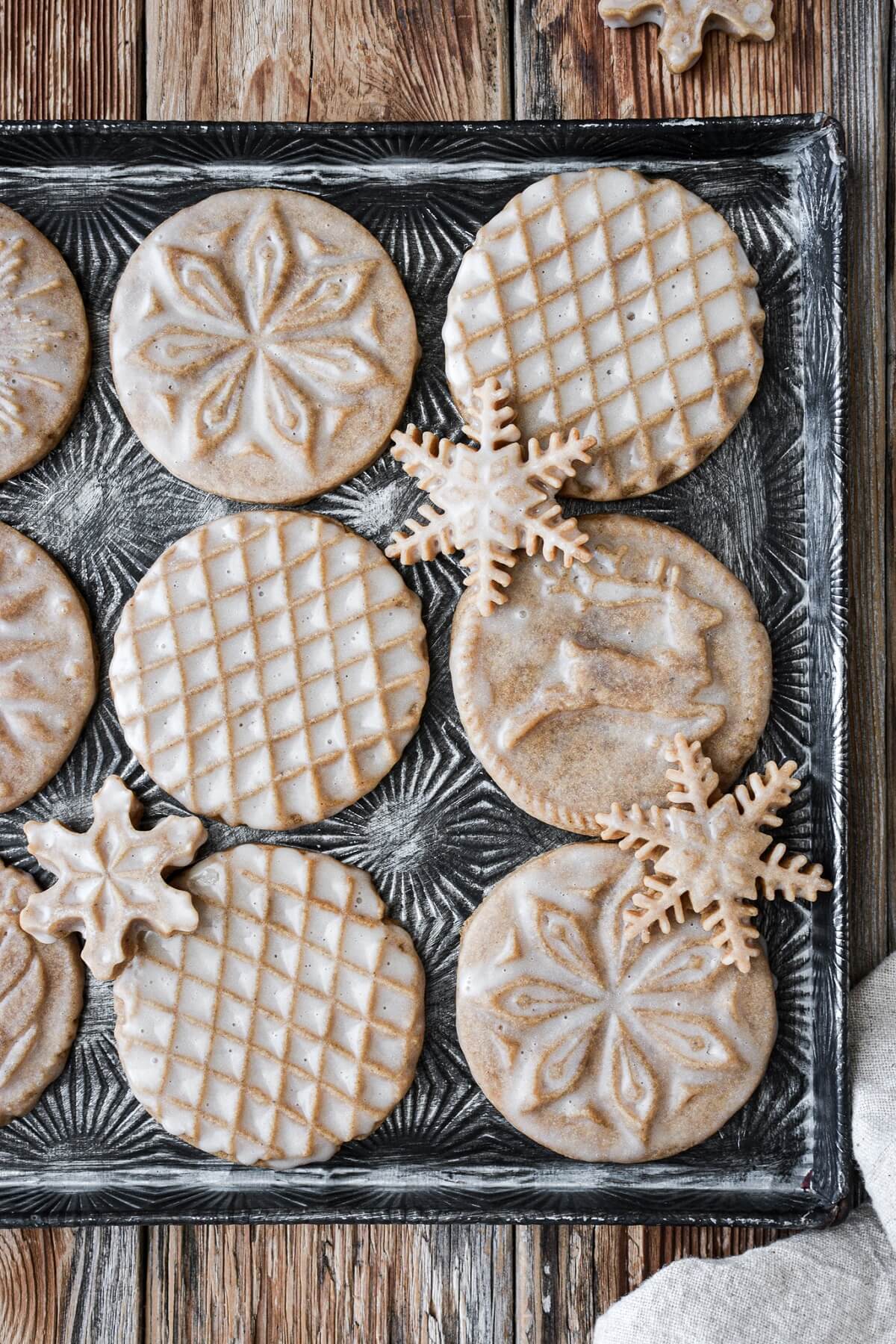 Stamped gingerbread cookies with vanilla icing.