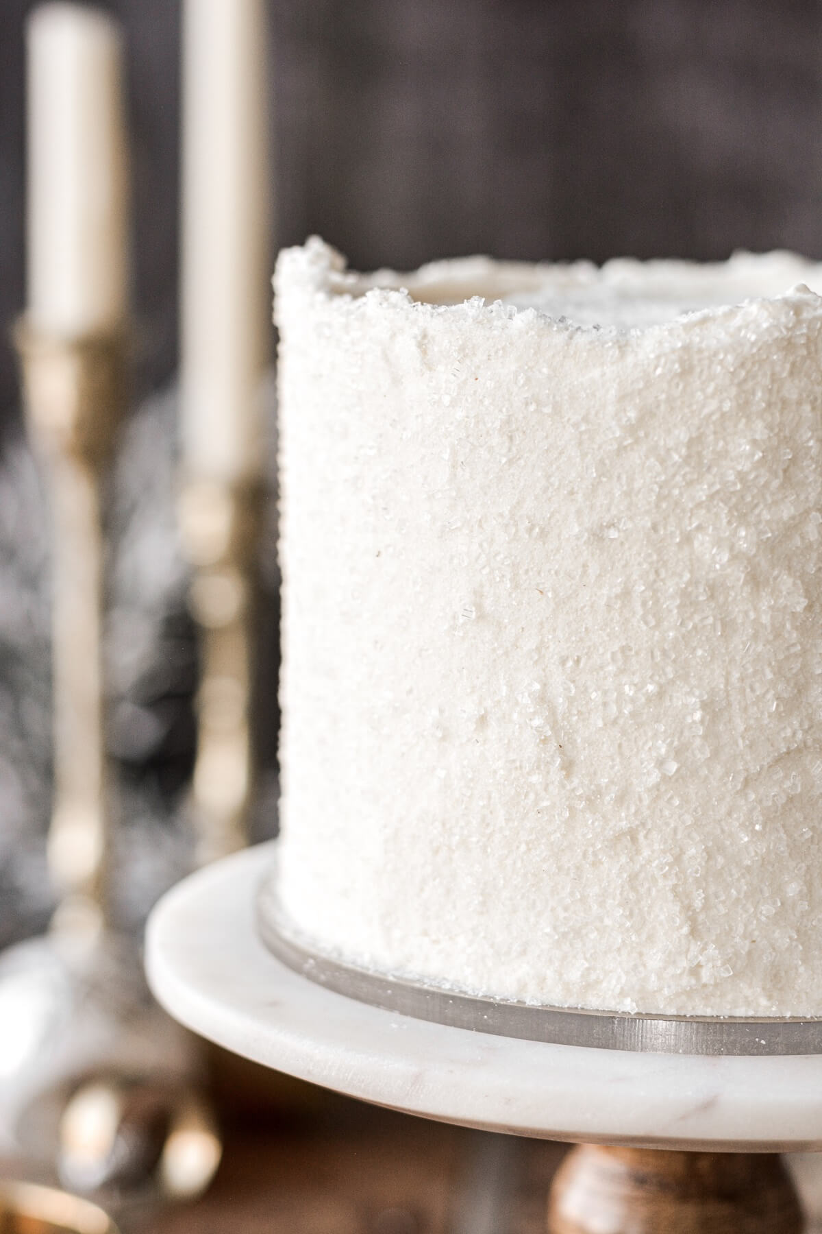 White Christmas cake covered in sparkling sugar.