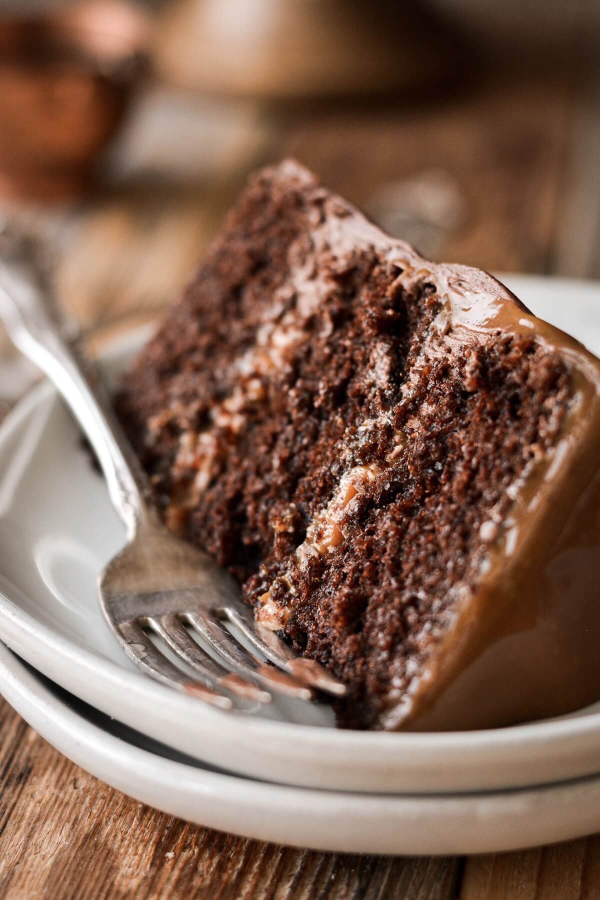 Slice of chocolate caramel toffee cake.