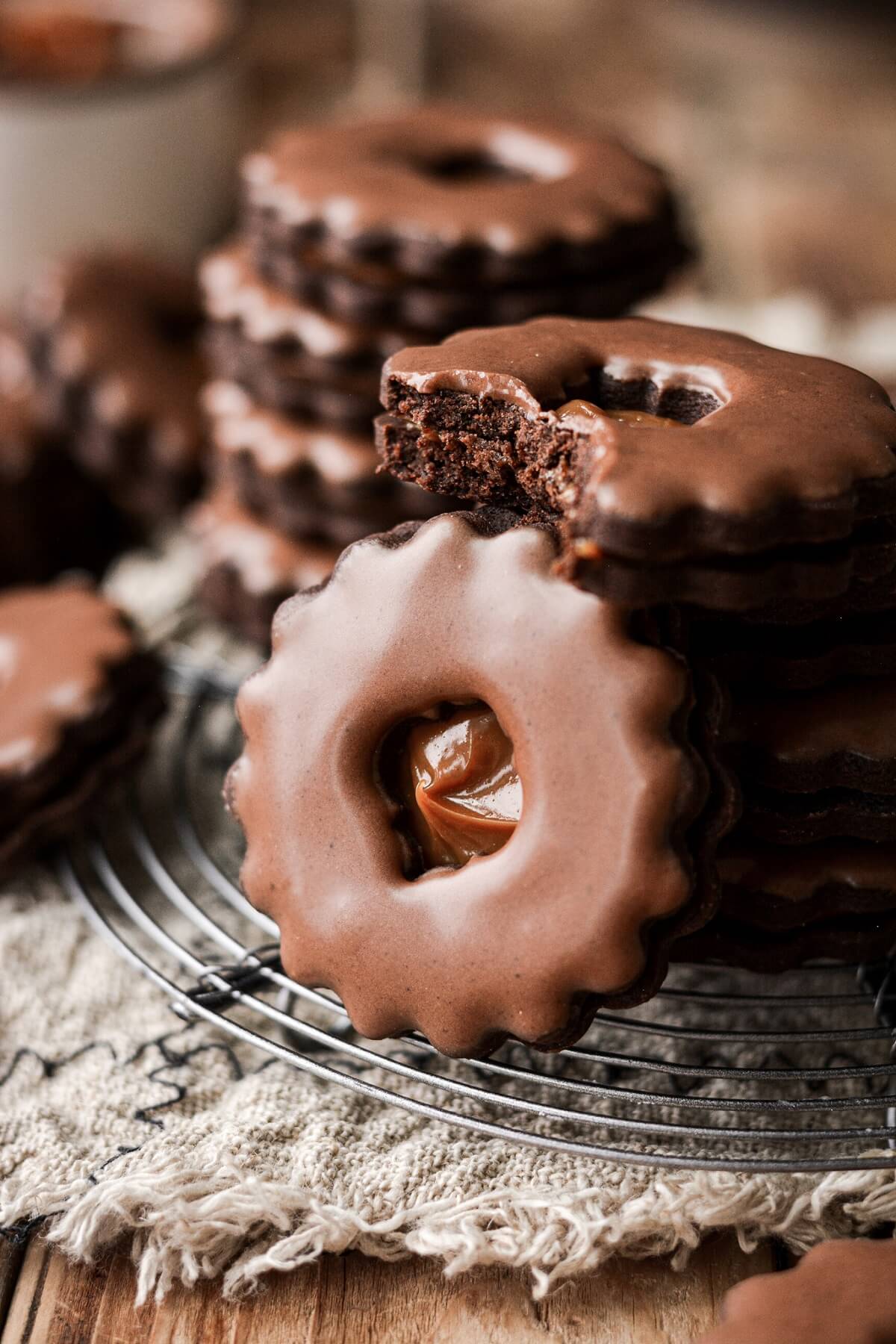 Chocolate linzer cookies with dulce de leche filling.