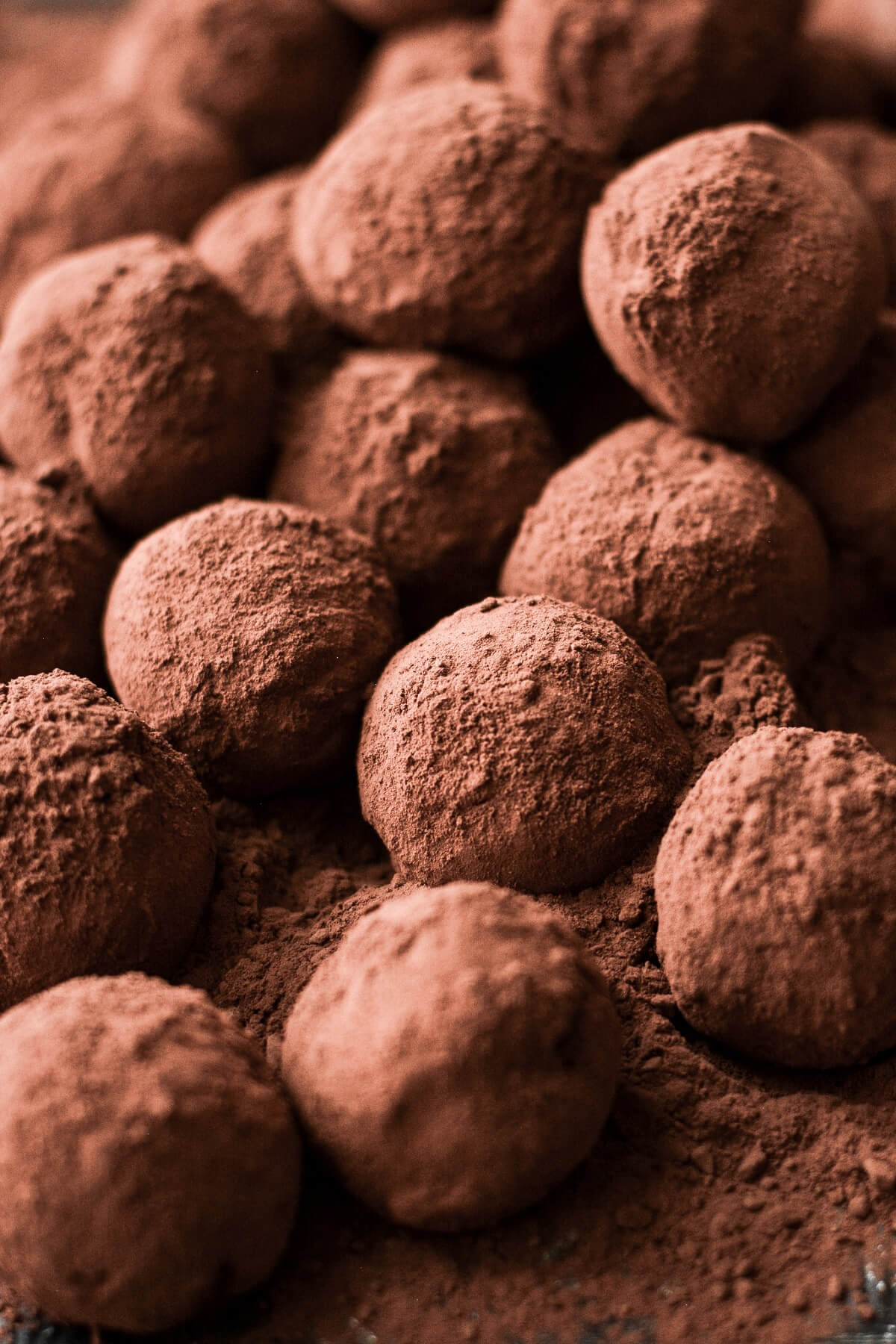Dark chocolate truffles in cocoa powder.