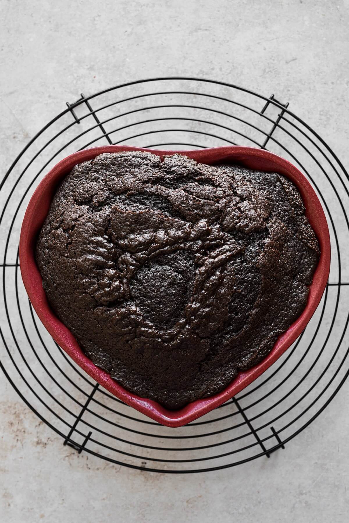 Chocolate cake in a heart shaped bundt pan.