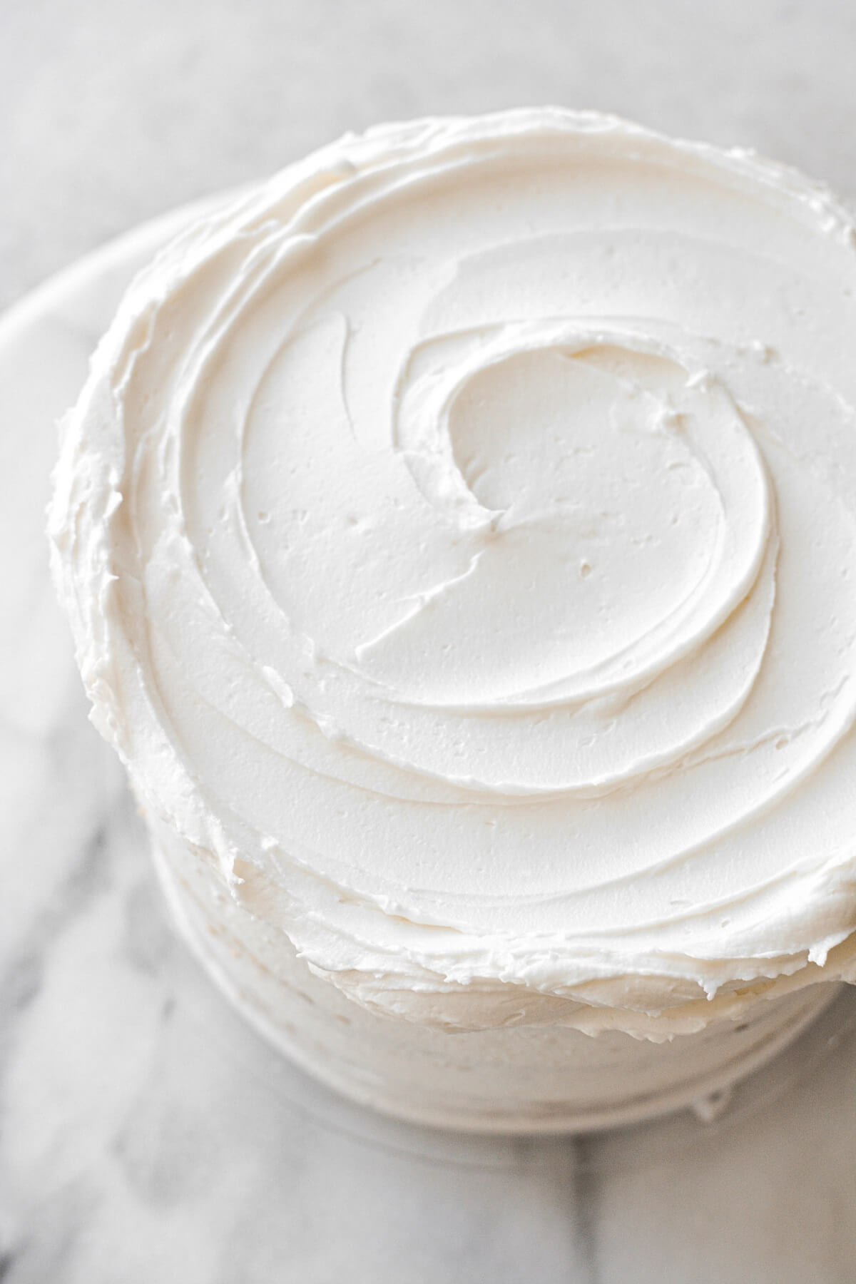 Vanilla buttercream on a cake.