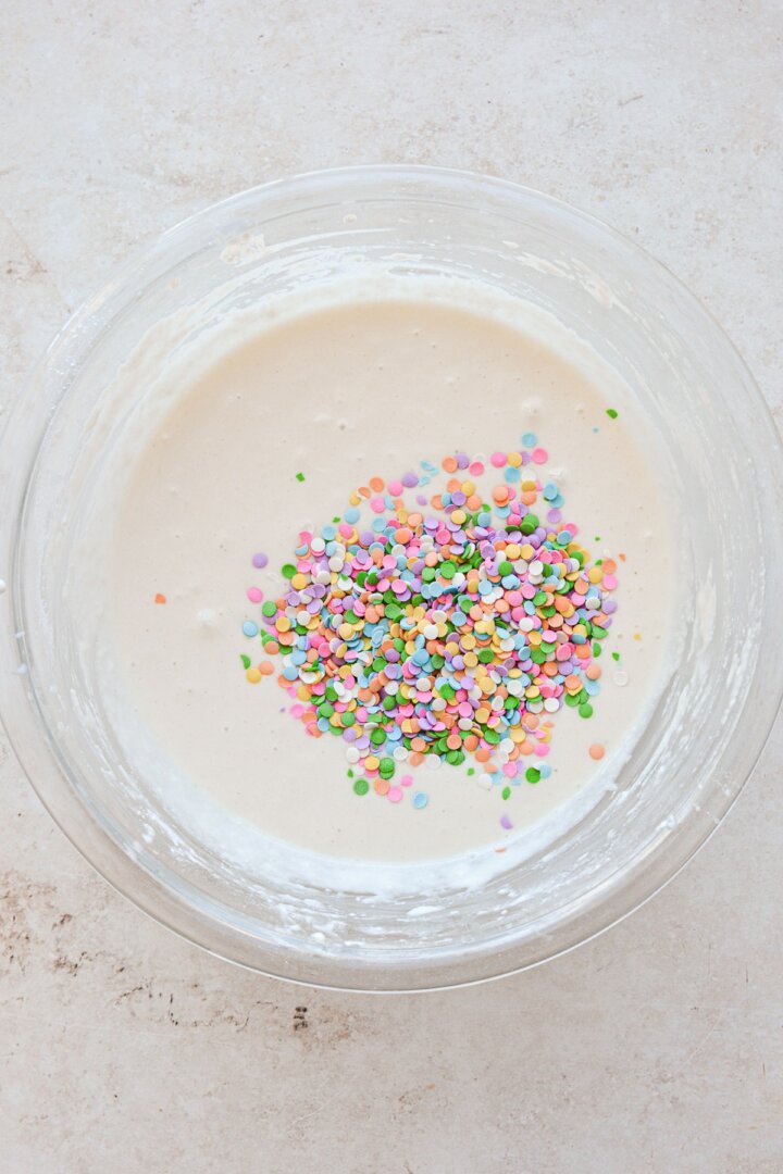 Step 7 for making an eggless funfetti cake.