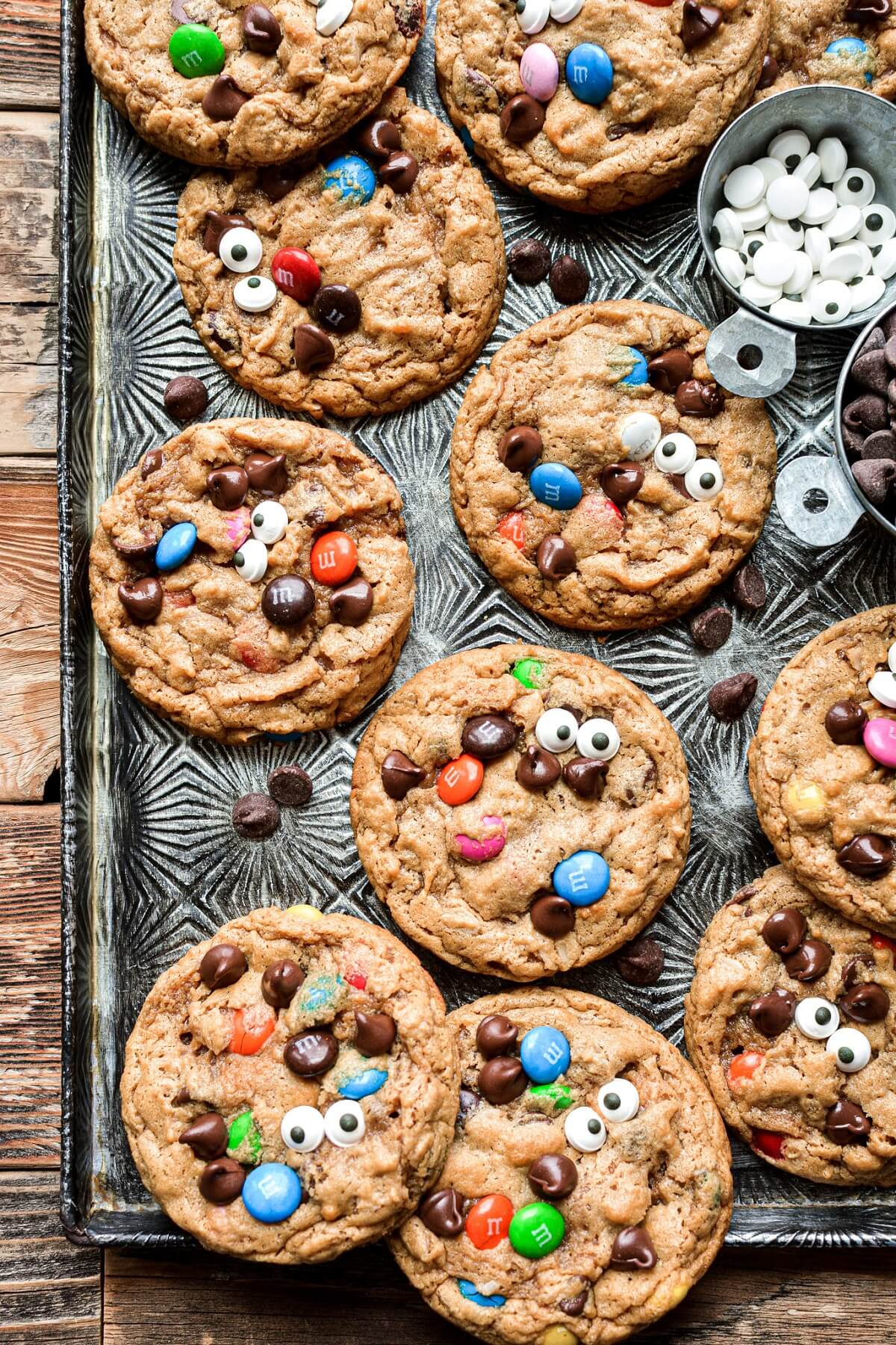 Monster cookies with candy eyeballs, chocolate chips and M&Ms.