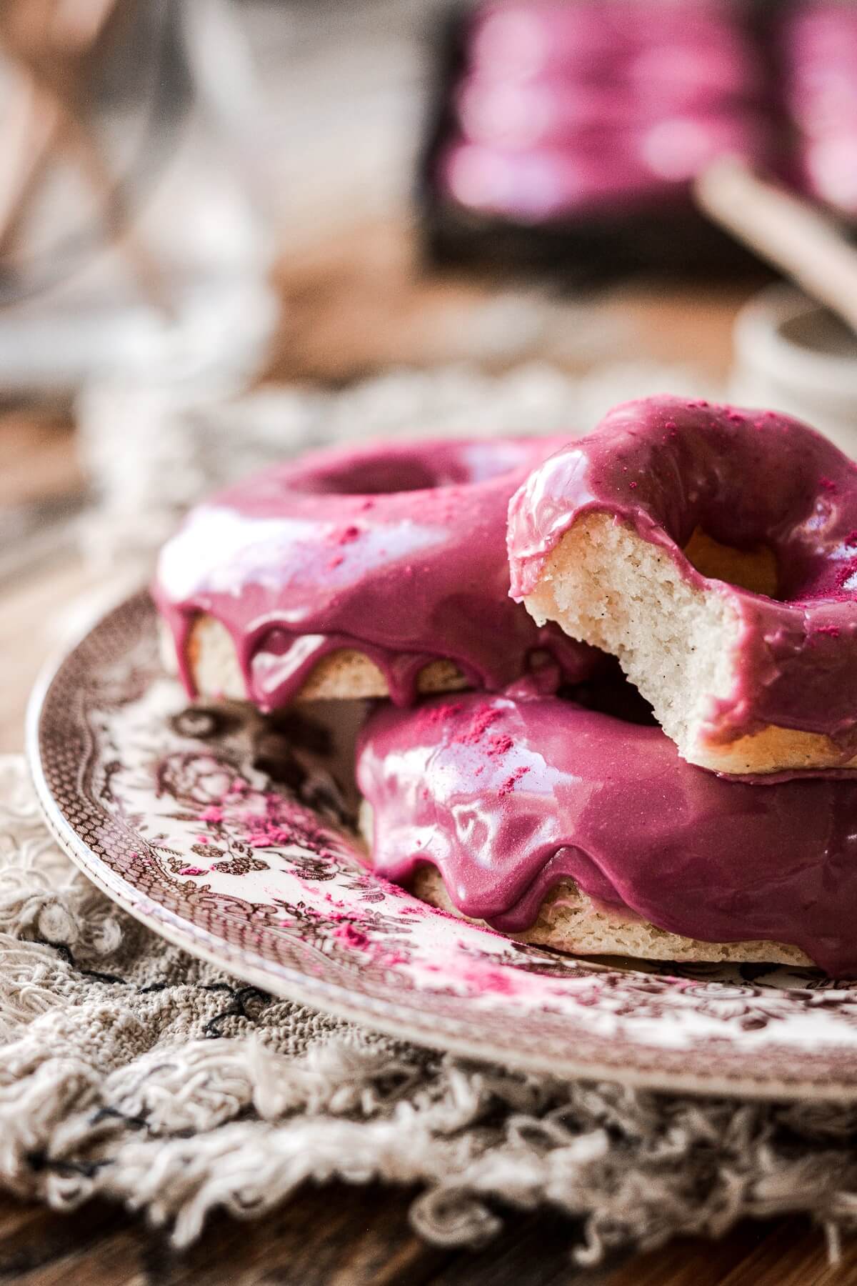 Vanilla cake donuts with blueberry icing.