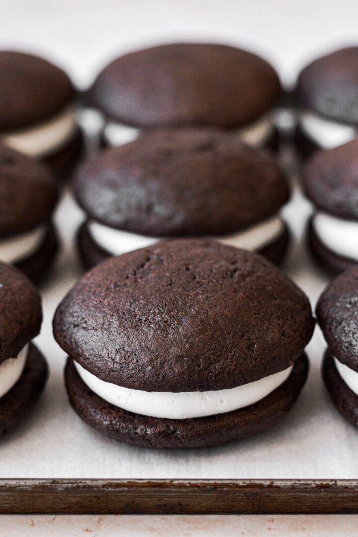 Chocolate whoopie pies with vanilla buttercream filling.