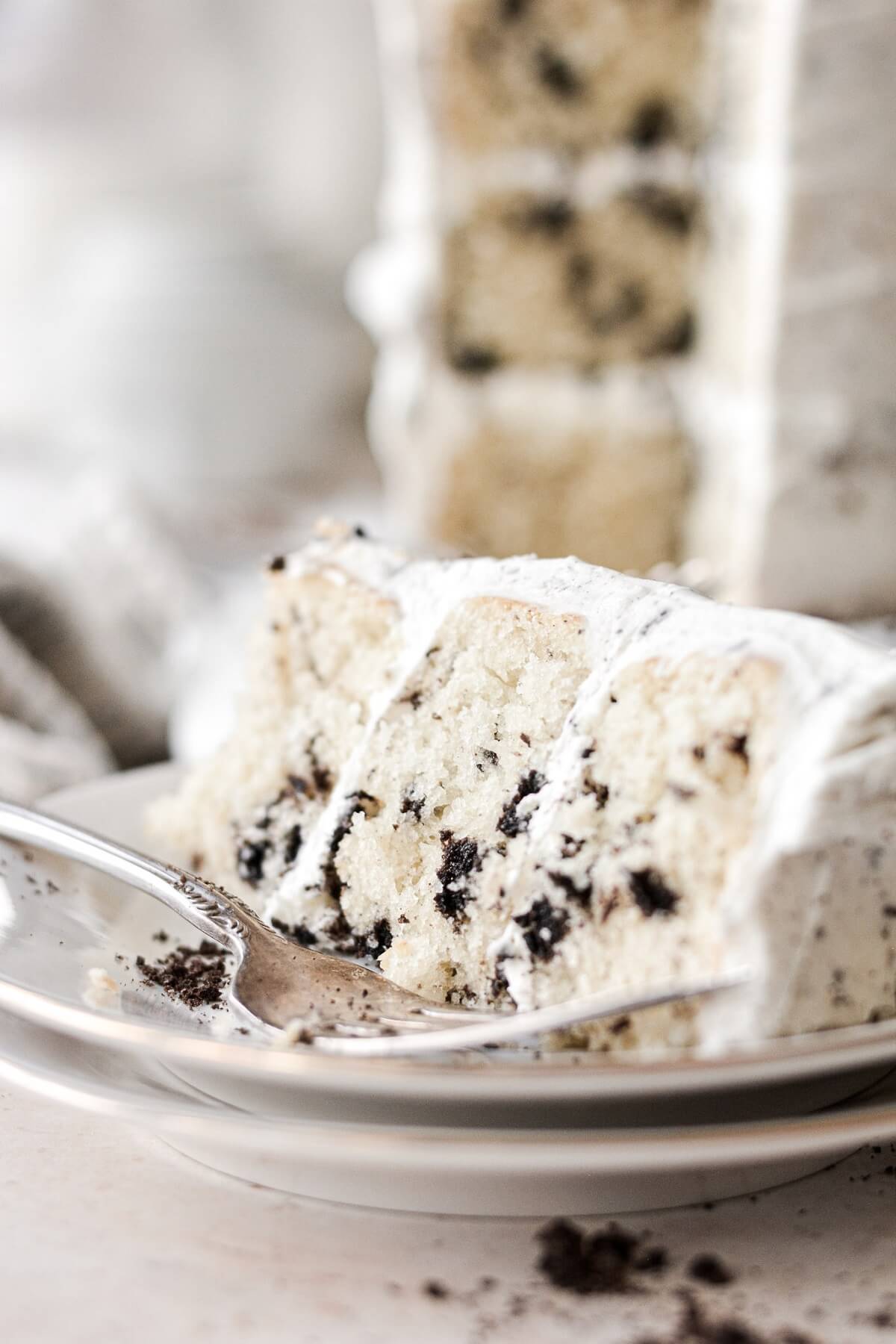 A slice of cookies and cream cake.