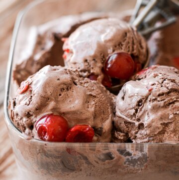 Maraschino cherries in chocolate ice cream.
