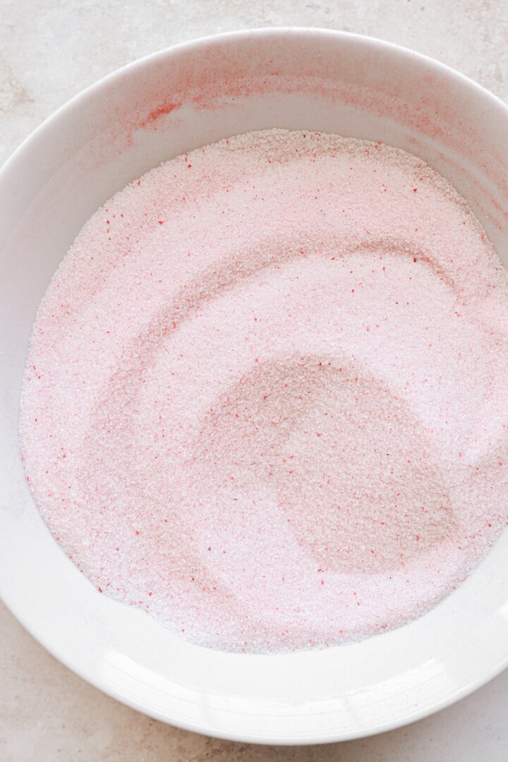 Bowl of pink strawberry sugar.