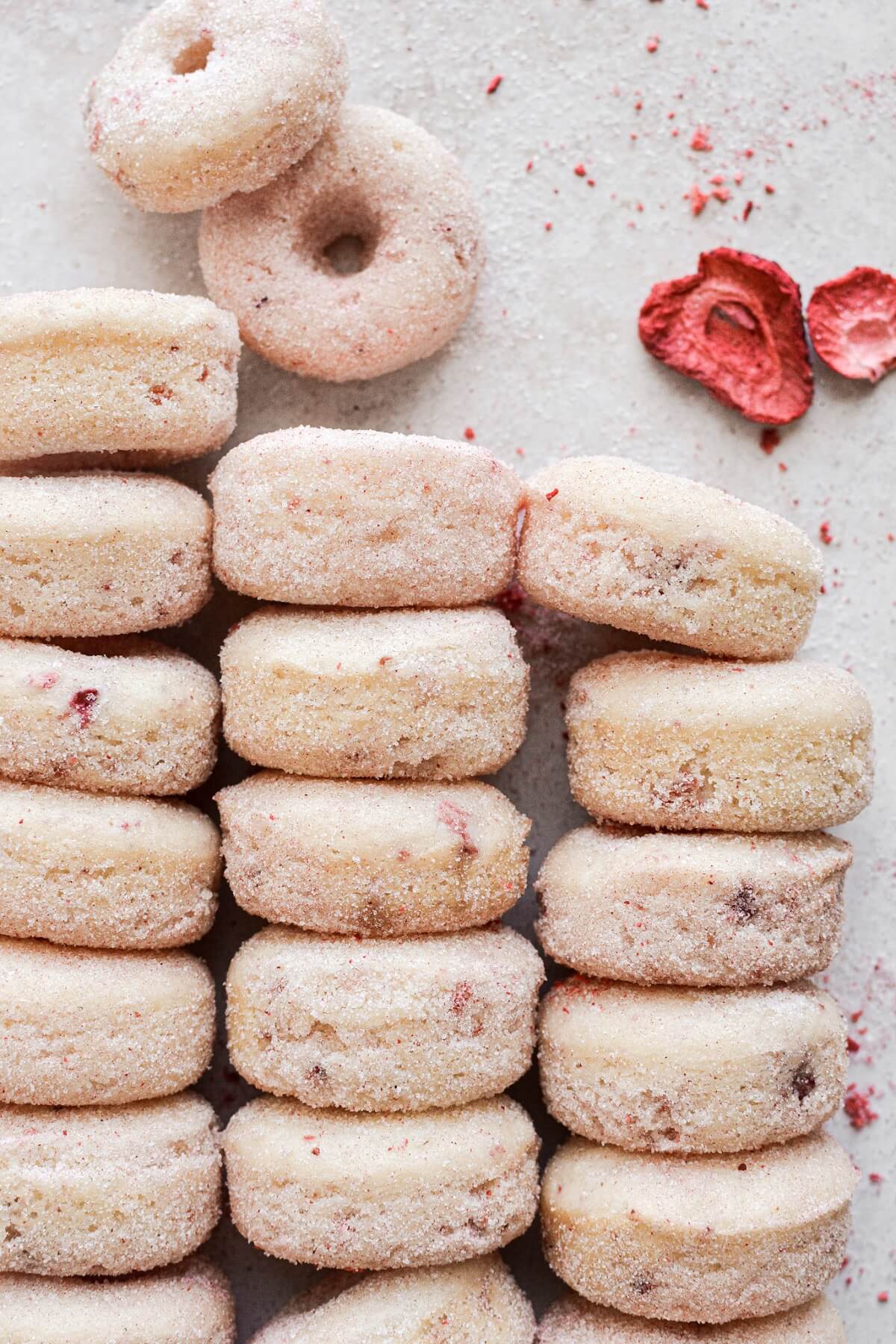 Strawberry sugar coated baked strawberry donuts.