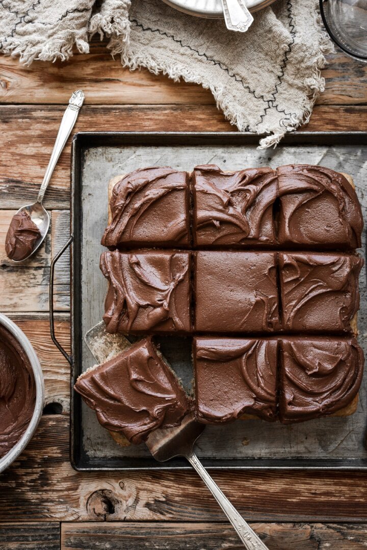 Chocolate banana snack cake cut into squares.