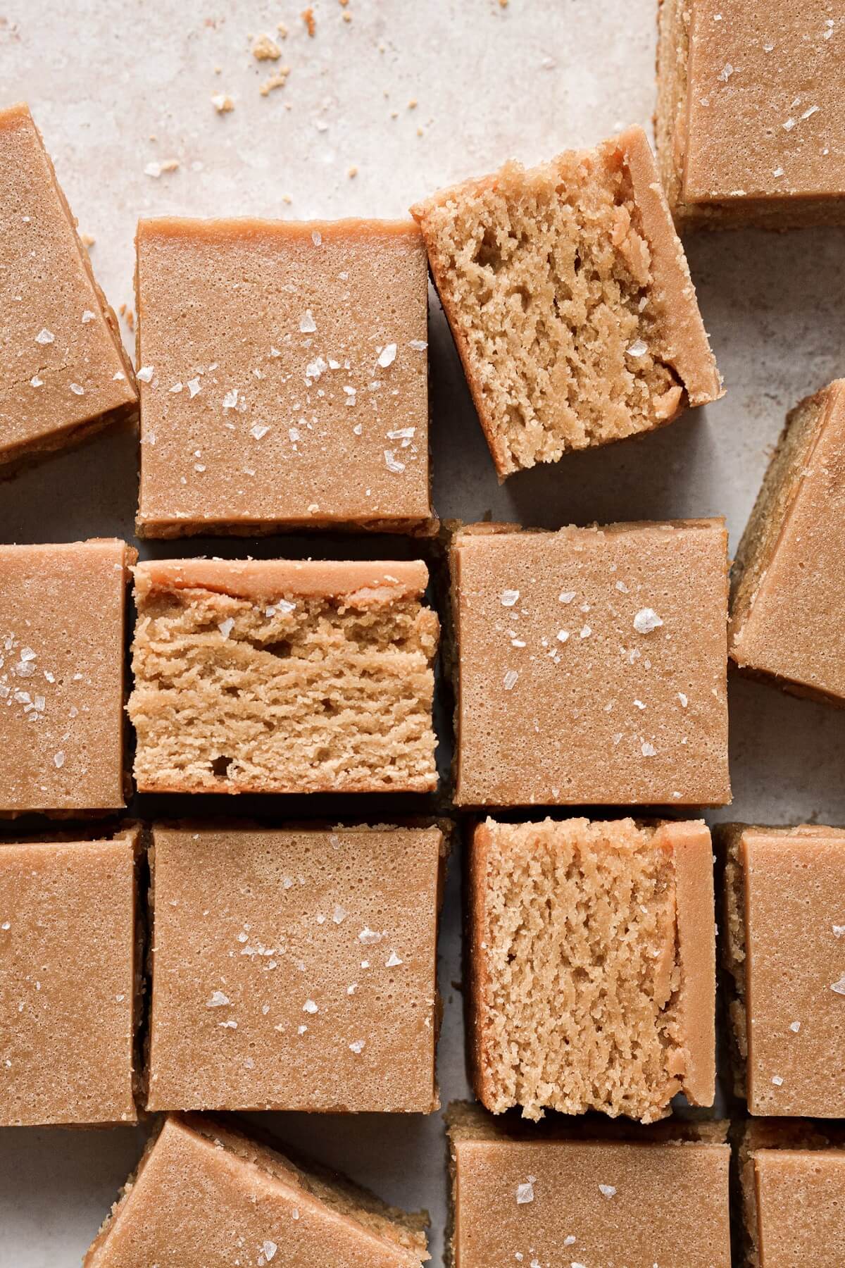 Peanut butter sheet cake, cut into squares.