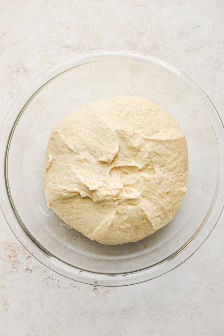 Step 5 for making potato rolls yeast dough.