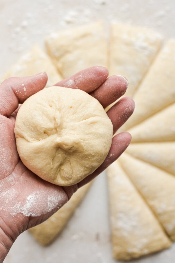 Step 9 for making potato rolls yeast dough.