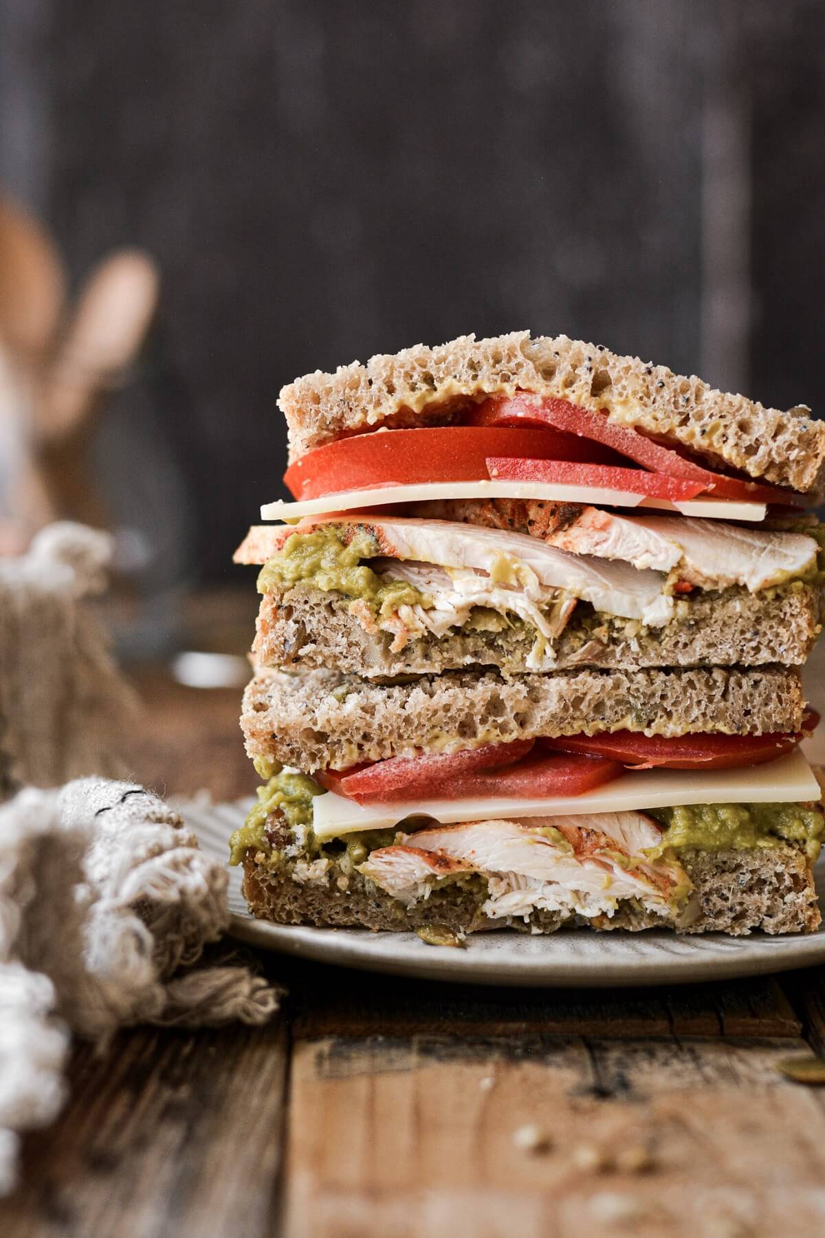 A sandwich made with homemade whole wheat bread.