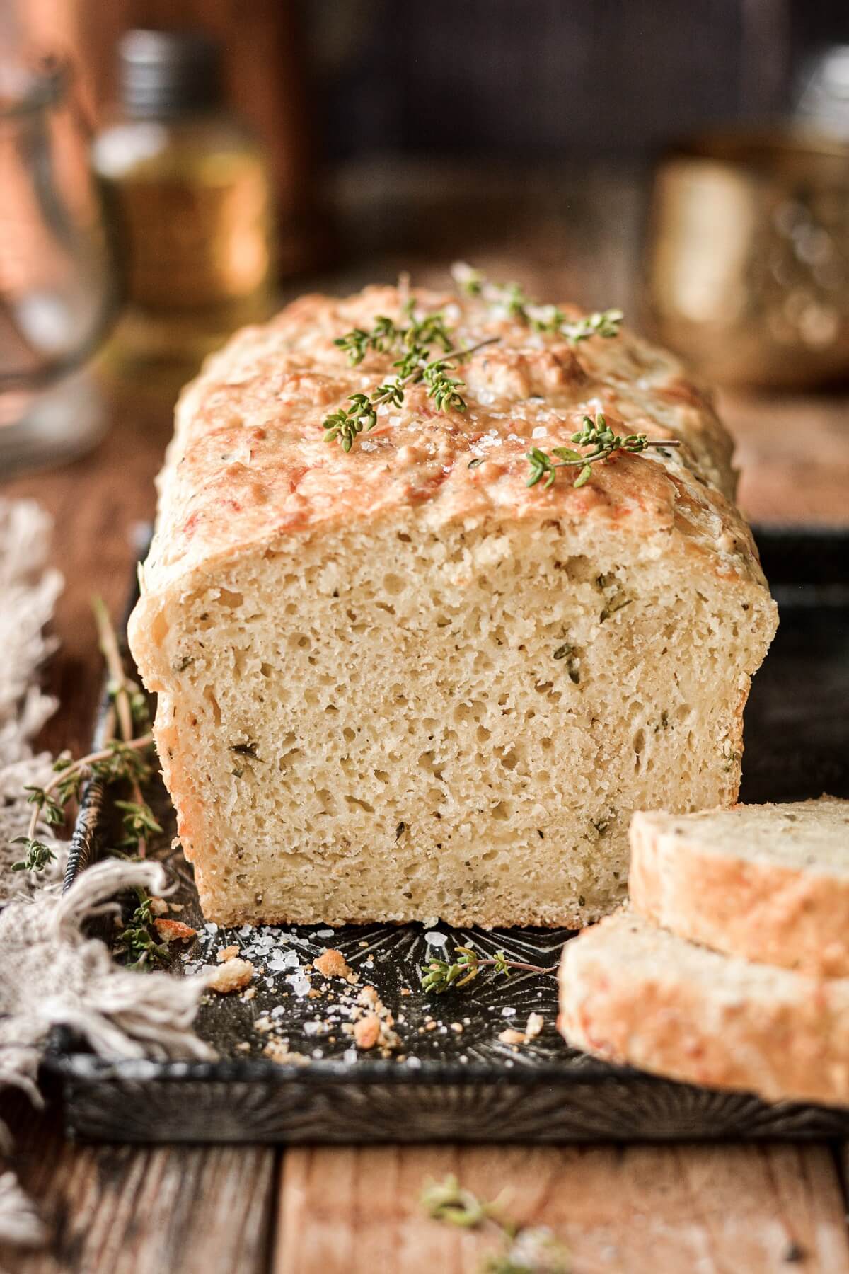 Buttermilk herb quick bread with fresh thyme leaves.