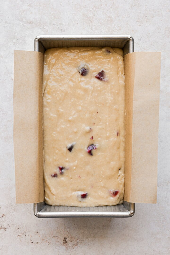 Step 7 for making a cherry amaretto loaf cake.