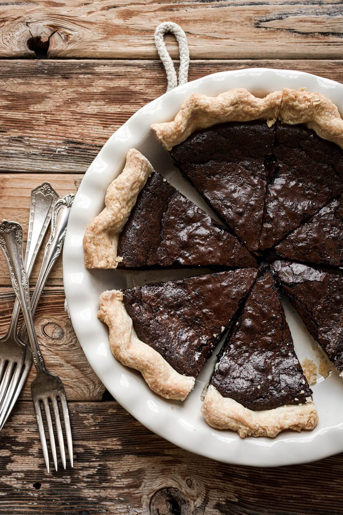 Brownie pie cut into slices.